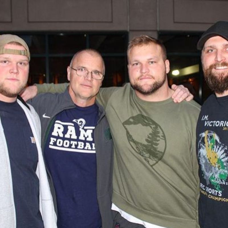 Brian Allen with his father and brothers